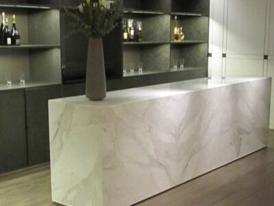 Book-Matched Calacatta Oro on a large custom-made island unit
