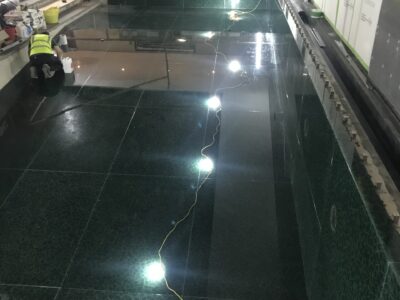 Installing Bespoke Glass Cladding in a Swimming Pool - Green Eco Glass