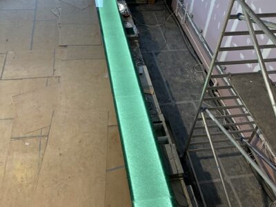 Glass Bar Top Installation of a bespoke Emerald bar top fabricated and installed by Stoneville