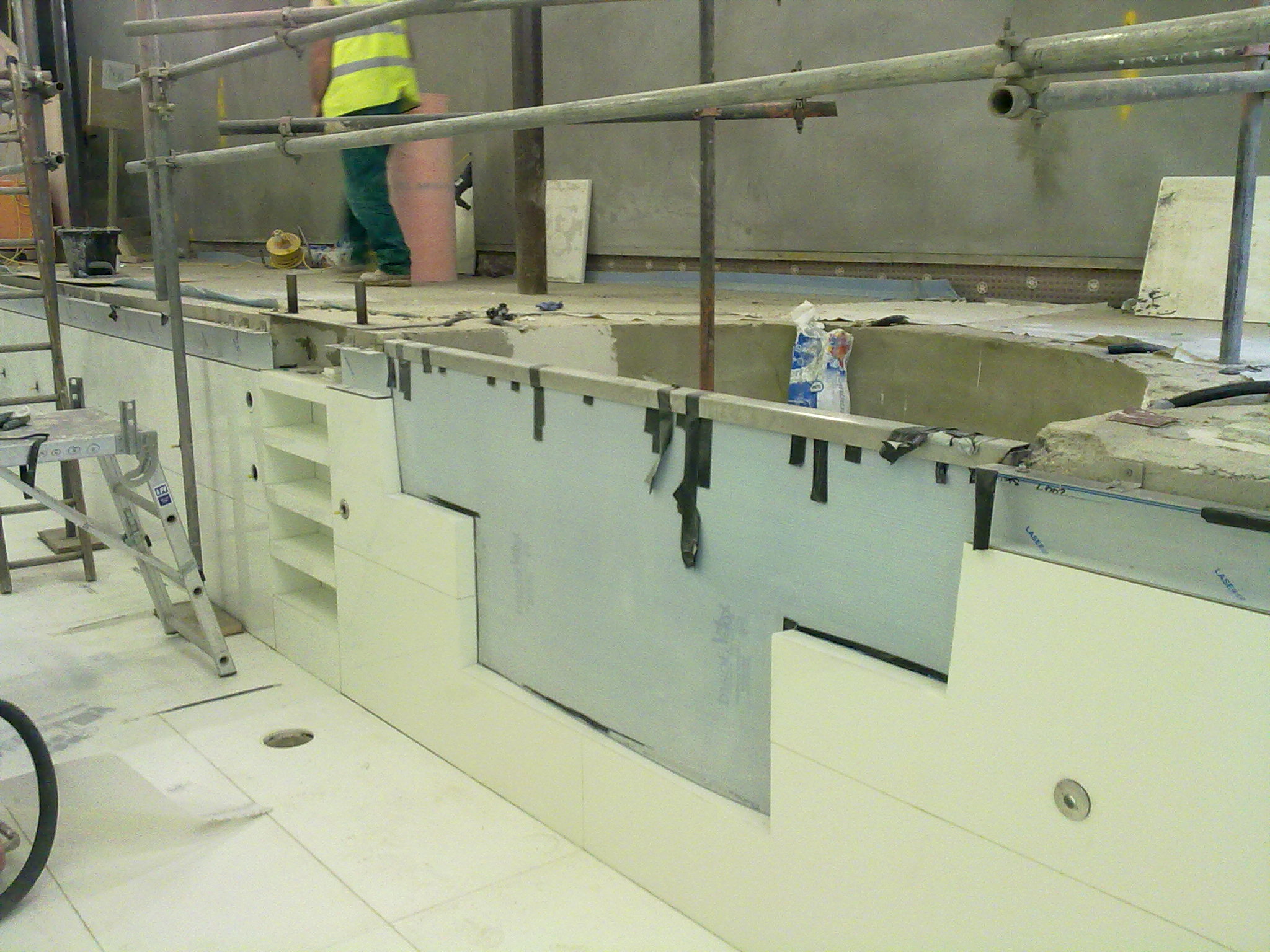Swimming pool cladding