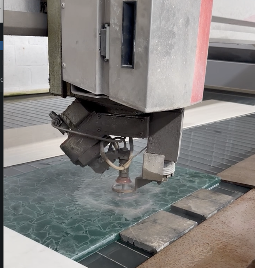 Waterjet cutting of recycled glass