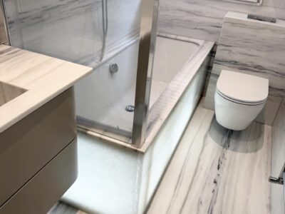 Bespoke Marble and Backlit EcoGlass Bathroom